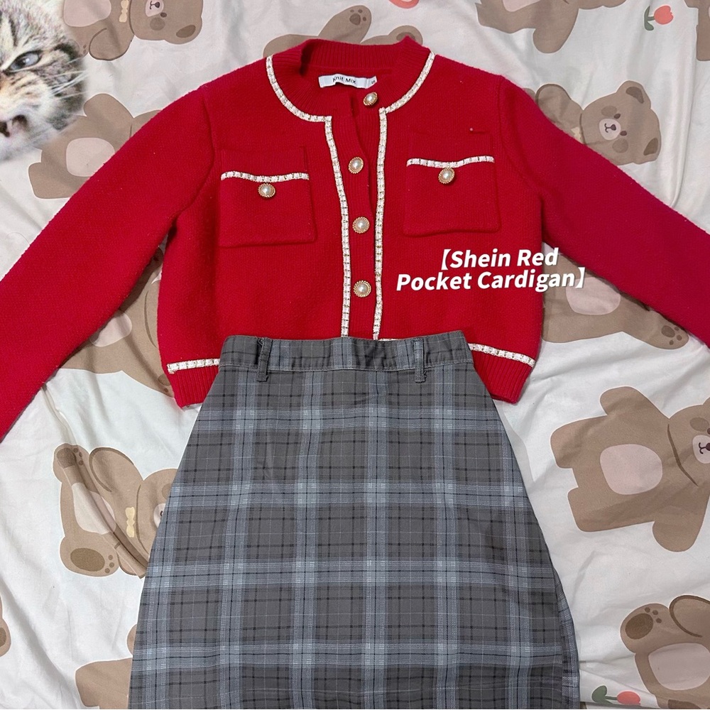 Red colored pocket cardigan.